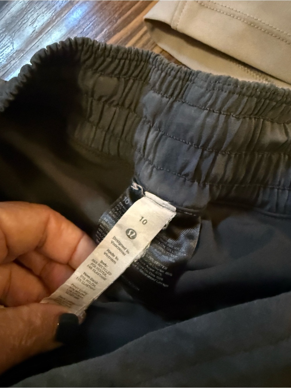 3 pair of lululemon shorts. 2 are size 12 and the gray are size 10. - Picture 5 of 7